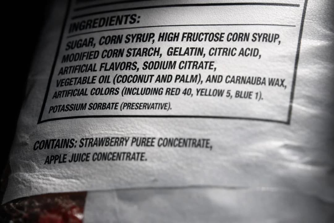 Ingredient label showing sugar and corn syrup before real fruit